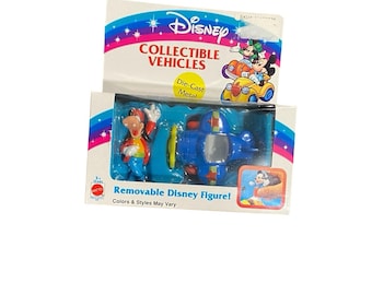 May include: A Disney Collectible Vehicles toy set featuring a die-cast metal airplane and a removable Goofy figure. The packaging includes the Disney logo, a rainbow design, and the text "Removable Disney Figure!"