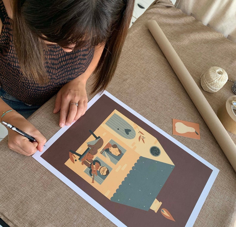 May include: A brown and yellow illustration of a house with a blue roof and a lit candle. The house has a window with a heart shape and a family of four inside. The illustration is on a brown background.