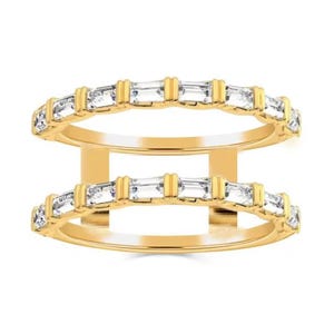May include: A double-band gold ring featuring two parallel rows of baguette-cut clear stones. Each row consists of multiple rectangular stones set horizontally within the gold metal frame, connected by vertical gold bars between each stone.