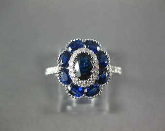 3.0 Ct Oval Cut Lab Created Blue Sapphire & Diamond 925 Silver Halo Ring White Gold Finish