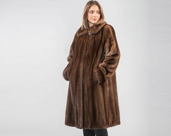 Mink fur coat in brown color with a collar