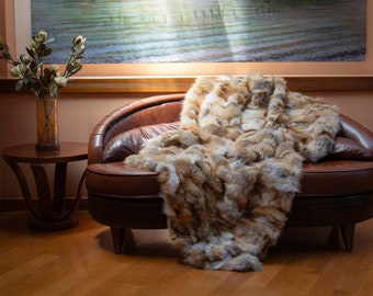 Luxurious Fox Fur Blanket in Golden Shades - Warmth and Elegance