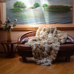 Luxurious Fox Fur Blanket in Golden Shades - Warmth and Elegance