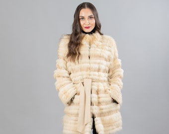 Raccoon fur coat with a belt in beige color