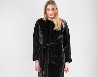 Mink fur coat with a belt in black color