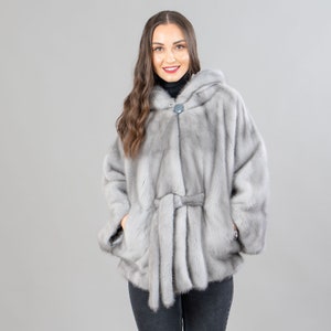 Gray hooded mink fur cape with a belt