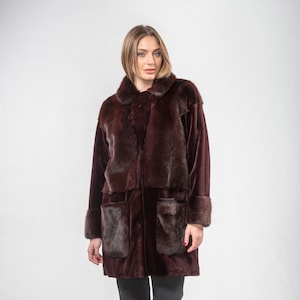 Mink fur jacket in burgundy color with a collar