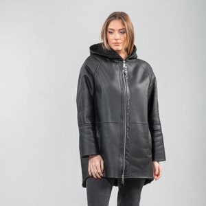 Sheepskin hooded jacket in black color