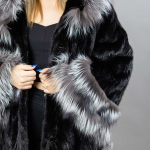 A closer look at the black mink fur coat.