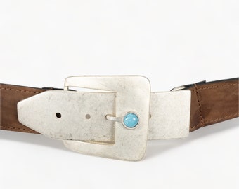 Genuine leather belt with a buckle in brown color