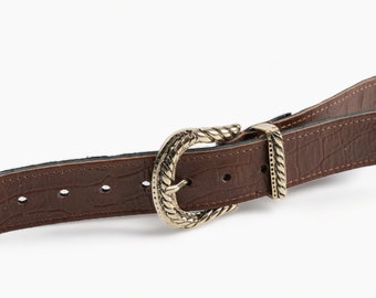 Real leather belt in brown color with a bronze buckle