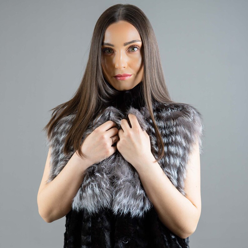 A closer look at the fox and mink fur vest.