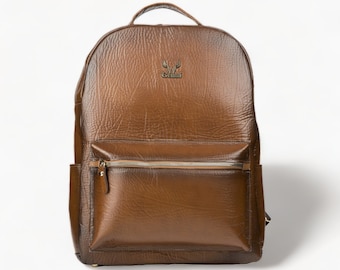 Real brown leather backpack with black shadows