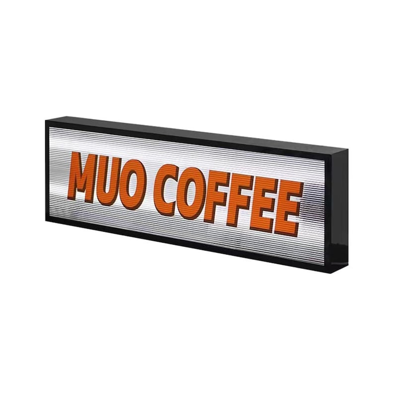 May include: A black framed sign with a silver background and orange text that reads "MUO COFFEE".
