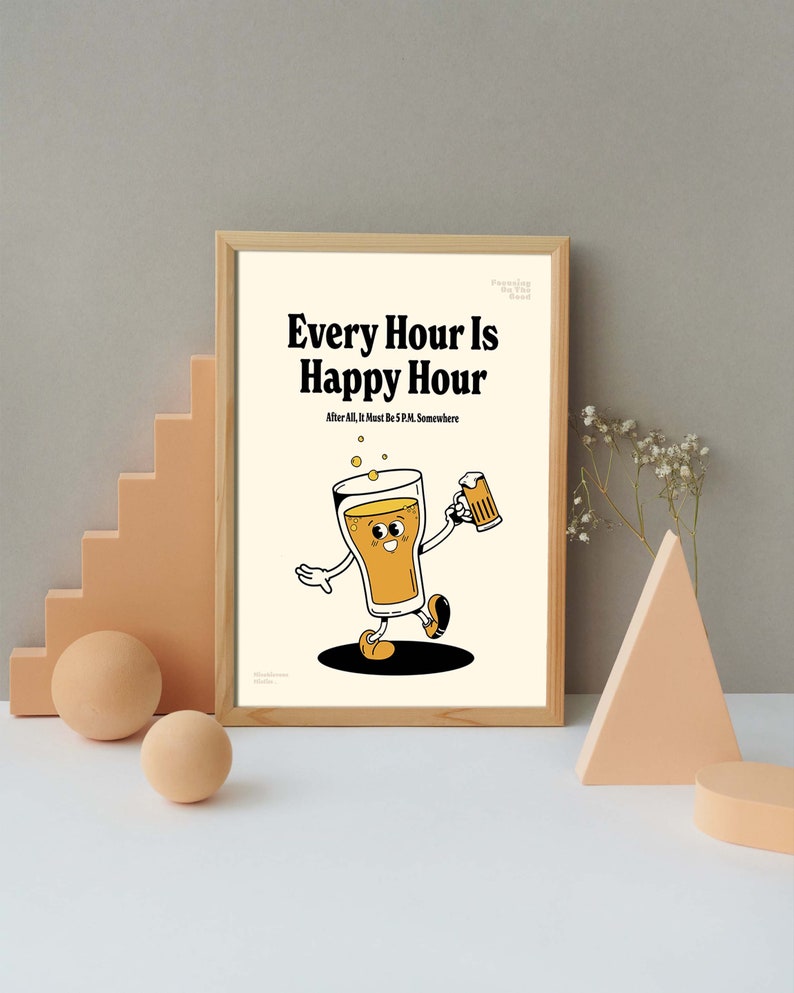May include: A framed print with the text "Every Hour Is Happy Hour" and a cartoon beer glass character. The beer glass is walking and holding a mug of beer. The print has a light beige background and a wooden frame.