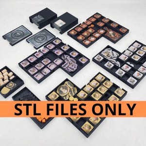 May include: A collection of black game organizers filled with game pieces, cards, and tokens. The organizers are arranged on a white surface. The image includes the text "STL FILES ONLY" in an orange banner.