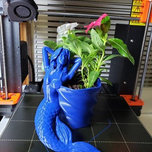 Vaso di fiori a forma di sirena