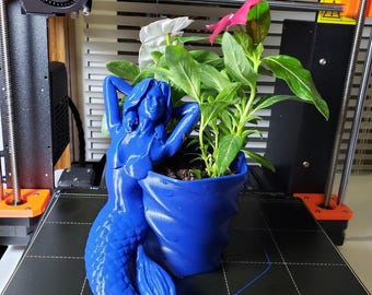 Vaso di fiori a forma di sirena