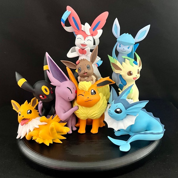 Statuette Pokémon Evoli en famille