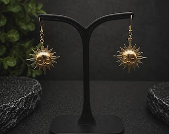 Boucles d’oreilles Esquie dorées – Bijoux gaming fantasy – Crochets plaqués or 18 carats – Cadeau gamer – Clair Obscur