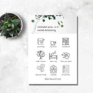 May include: A printable set of reward cards with black and white illustrations. The cards feature activities like journaling, taking a nap, and meditating. The text on the card reads "minimalist series - nr 4 mental decluttering" and "Skyler Reward Cards".