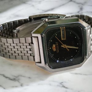 Vintage ORIENT Crystal TV Square automatisch herenhorloge, zwarte wijzerplaat, originele roestvrijstalen armband, 21 juwelen, kledingstijl
