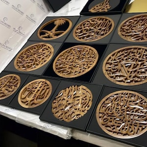 "Intricately carved Arabic calligraphy wall hanging with Bismillah inscription, crafted from premium teak wood."