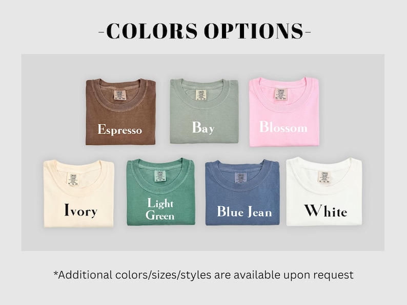 Pode incluir: Imagem de camisetas dobradas em v&aacute;rias cores: Espresso, Bay, Blossom, Ivory, Verde claro, Blue Jean e Branco. O texto "-OP&Ccedil;&Otilde;ES DE CORES-" est&aacute; no topo, com "Cores/tamanhos/estilos adicionais est&atilde;o dispon&iacute;veis mediante solicita&ccedil;&atilde;o" na parte inferior.