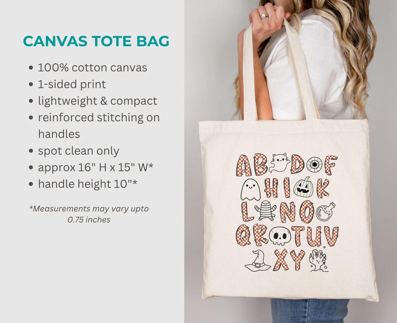 May include: A natural-colored cotton canvas tote bag featuring a Halloween-themed alphabet graphic. The letters are filled with an orange and white checkered pattern, interspersed with illustrations of ghosts, pumpkins, skulls, and witch hats.