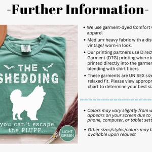 May include: Light green t-shirt with the text "THE SHEDDING" and a white dog silhouette. The phrase "you can't escape the FLUFF..." is below the dog. The shirt is garment-dyed and has a relaxed fit.