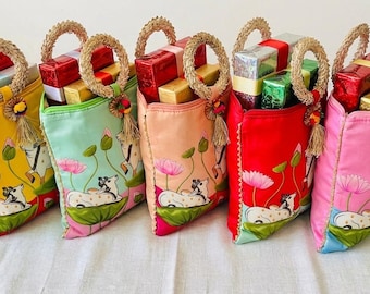 Assorted and Colorful Lotus and Cow Pichwai Print Silk Potli Bags|Return Gifts|Wedding Favors | Housewarming| Party favor return gifts potli