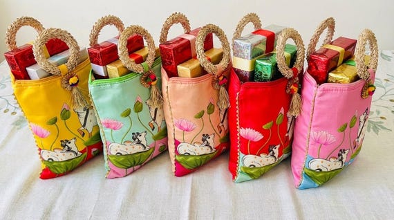 Assorted and Colorful Lotus and Cow Pichwai Print Silk Potli Bags|Return Gifts|Wedding Favors | Housewarming| Party favor return gifts potli