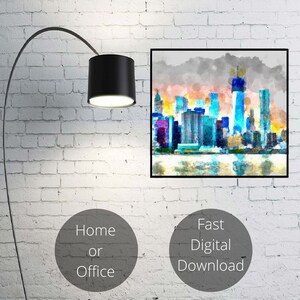 May include: A digital painting of a cityscape with a blue and orange color scheme. The painting is framed and hanging on a white brick wall. The text "Home or Office" and "Fast Digital Download" is visible below the painting.