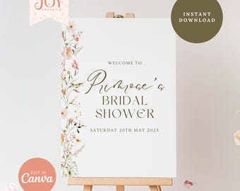 May include: A white sign with a floral border on the left side. The sign says "Welcome to Primrose's Bridal Shower Saturday 20th May 2025".