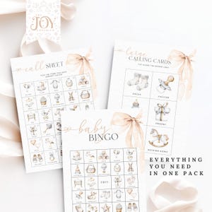 May include: A set of printable baby shower bingo cards with a watercolor design. The cards feature a variety of baby items, such as socks, a pacifier, a present, and a rocking horse. The text "Everything You Need In One Pack" is printed on the cards.