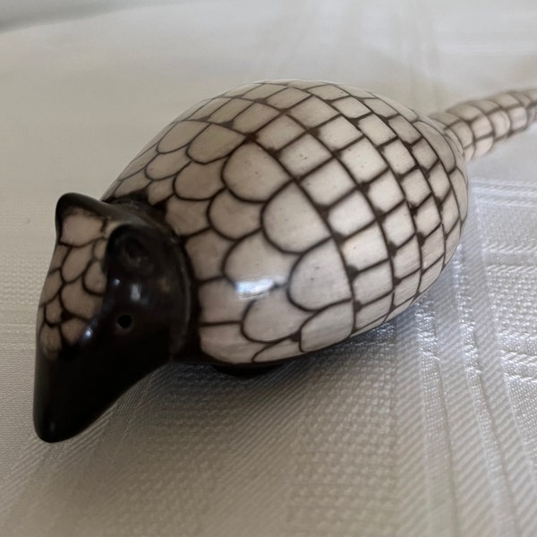 Armadillo figurine signed. Unknown material- thinking fired clay