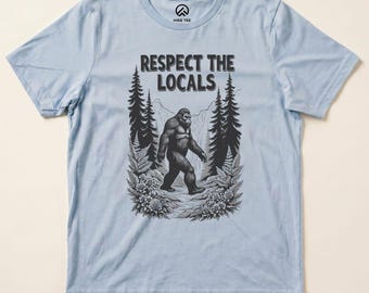 Camiseta de Bigfoot con el lema "Respeta a los lugareños"