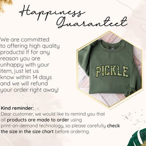 a green shirt with the word pickle on it