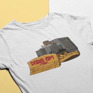 May include: White t-shirt with a cartoon illustration of a yellow bulldozer with the words "DOZE EM" written on the side.