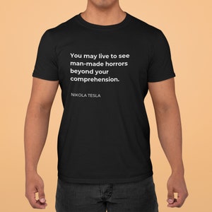 May include: Black t-shirt with a white quote by Nikola Tesla: "You may live to see man-made horrors beyond your comprehension."