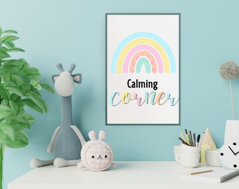 May include: A framed print with a rainbow design and the text "Calming Corner" in a light blue, pink, and yellow color scheme. The print is hanging on a light blue wall.