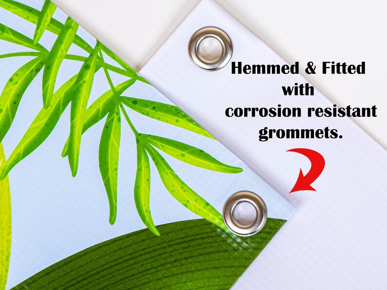 Shown are two vinyl banner corners finished with silver metal corrosion resistant grommets applied to hemmed edges.