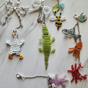 Abalorio para teléfono con forma de animal: ganso, caimán, ajolote y abeja