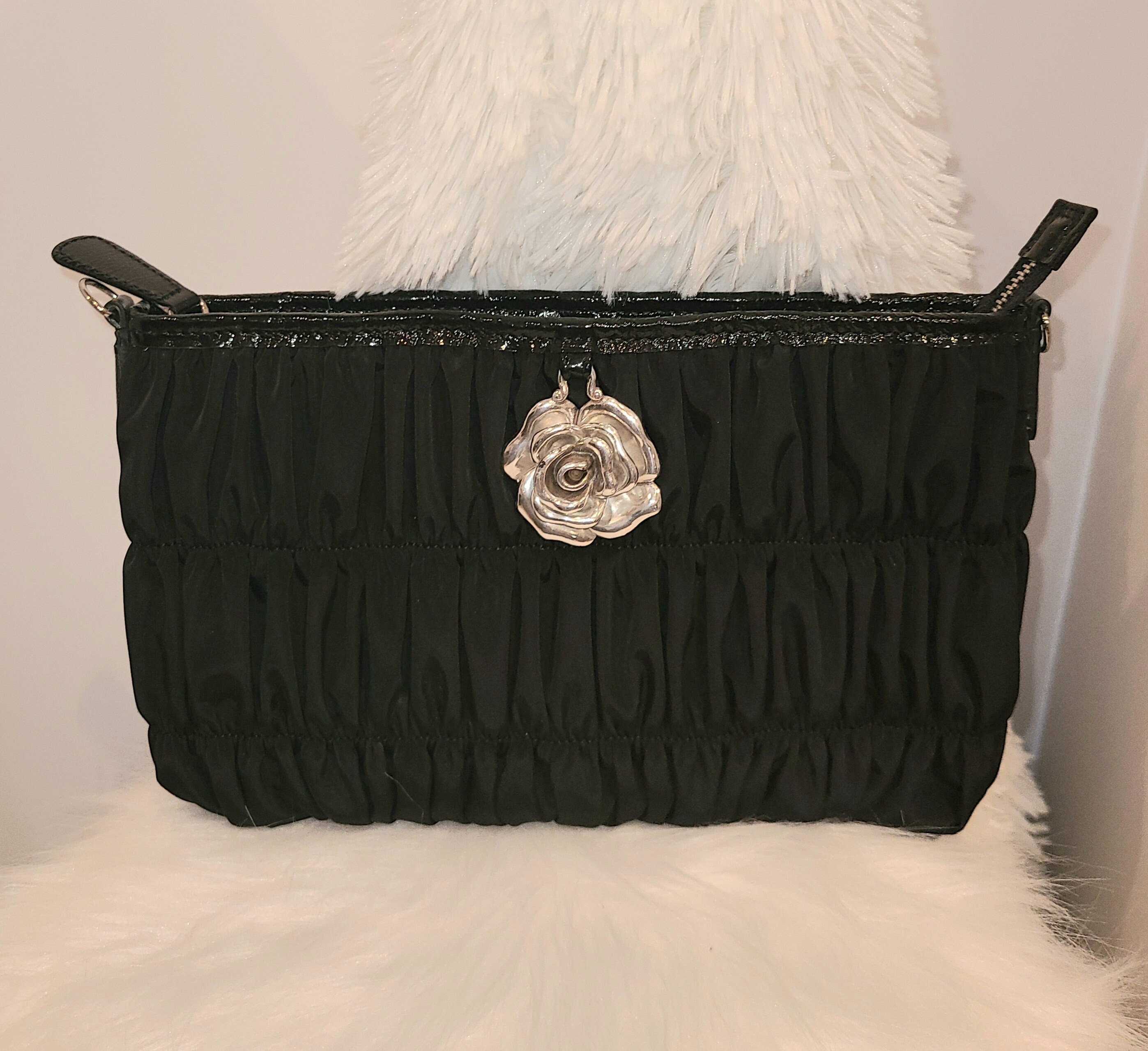 Lot 262 - A vintage Chanel black satin evening bag
