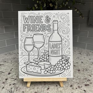 May include: A black and white line art canvas on a wooden easel featuring a wine bottle labeled Ladies' Night, two wine glasses, a wedge of Swiss cheese, and clusters of grapes. The text Wine & Friends is displayed at the top with swirl accents.