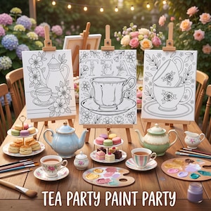 May include: Three canvases on wooden easels featuring black and white line art of tea sets and flowers. The center canvas displays the word TEA. Below are ceramic teapots, teacups, tiered trays with macarons and cakes, and paint palettes.