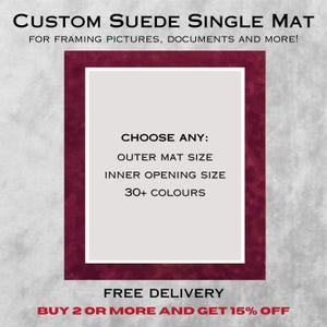 May include: A custom suede single mat for framing pictures and documents. The text reads: CUSTOM SUEDE SINGLE MAT, FOR FRAMING PICTURES, DOCUMENTS AND MORE!, CHOOSE ANY: OUTER MAT SIZE, INNER OPENING SIZE, 30+ COLOURS, FREE DELIVERY, BUY 2 OR MORE AND GET 15% OFF.