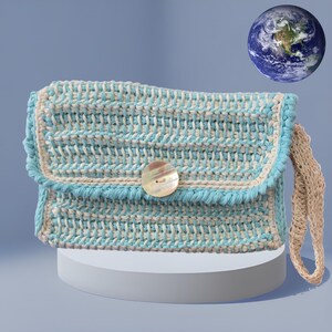 Bolso de mano, cartera o monedero con cierre magnético. Para maquillaje, teléfono y gafas de sol. Un regalo de crochet elegante, versátil y funcional.