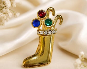 Vintage Monet Christmas Stocking Brooch, Gold Tone Holiday Pin with Rhinestones & Cabochons