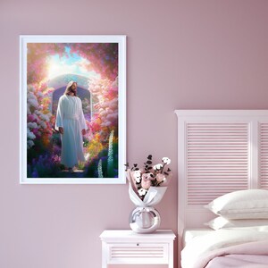 May include: A framed print of a painting depicting a man in a white robe walking through a garden with a bright light shining behind him.